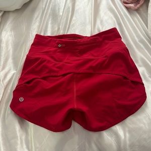 Red Lululemon shorts